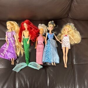 A collection of 5 vintage Disney Princess fashion dolls
